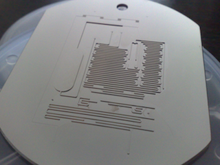 Injection mold with 2-level microfluidic design and drafted sidewalls on all microstructures